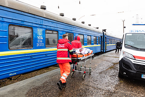Workers with Médecins Sans Frontières take injured Ukrainians to hospital in Lviv in 2022
