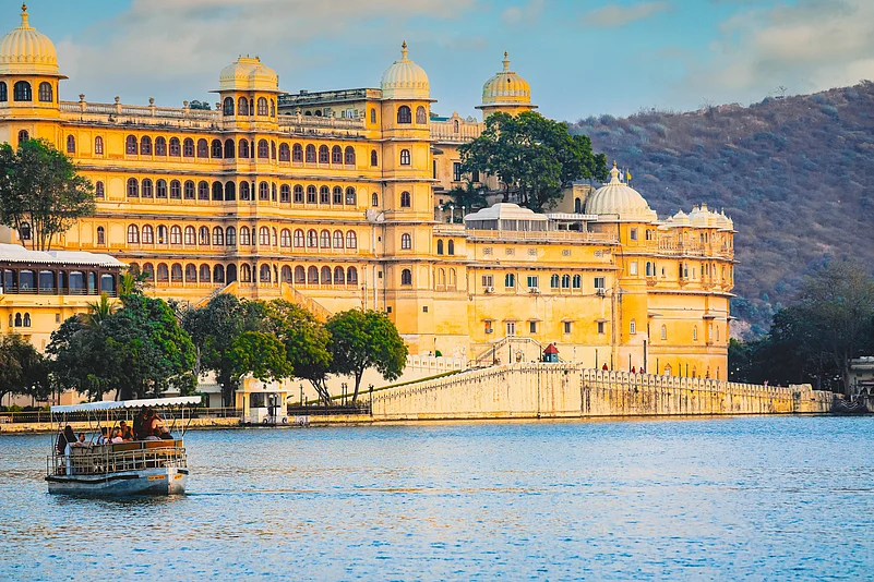 Panoramic view of the Udaipur City Palace Complex from Lake Pichola in Udaipur, Rajasthan