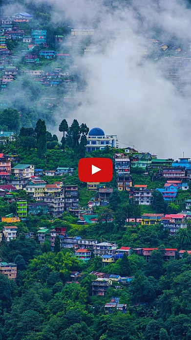 Shutterstock : A mist-laden view of Darjeeling