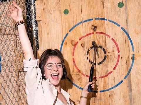Maniax is a bar that champions the art of urban axe throwing