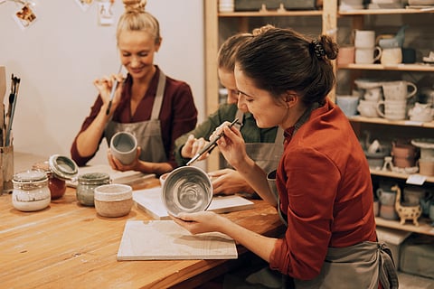 Young women at an art workshop