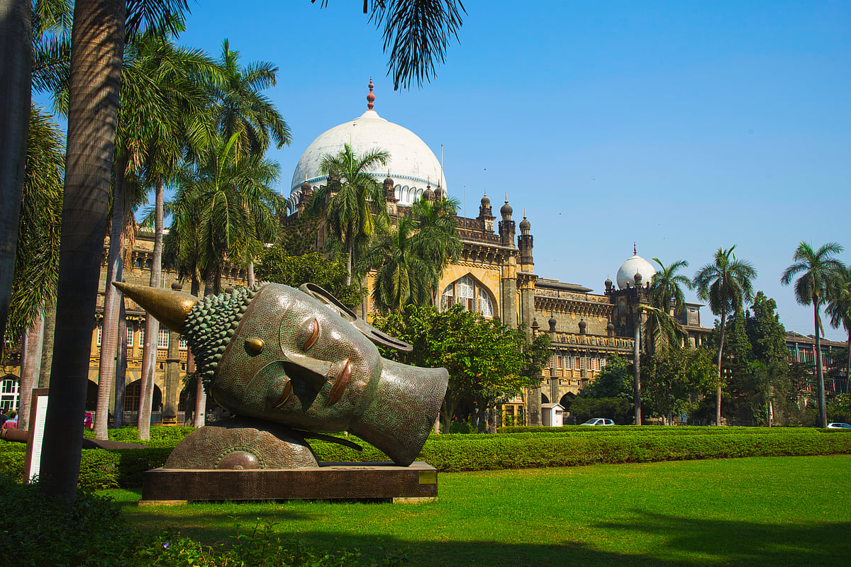 twabian/Shutterstock : A Buddha head at the Chhatrapati Shivaji Maharaj Vastu Sangrahalaya in Mumbai