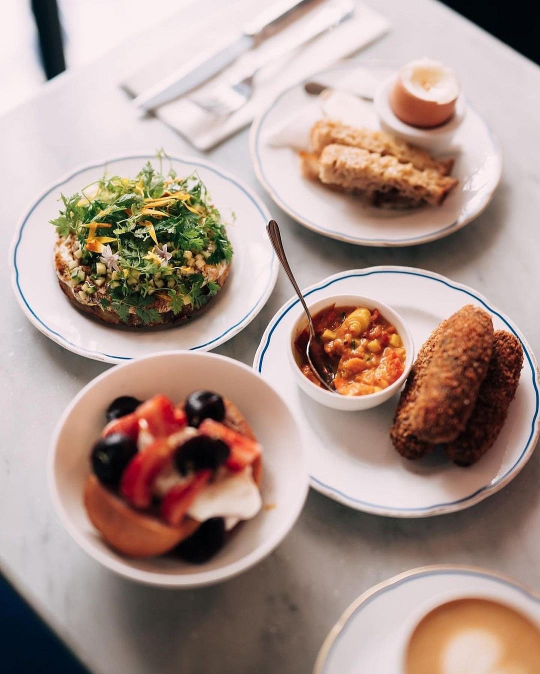 HB19s menu features star dishes like soft-boiled eggs with buttery mouillettes, gravlax, and more