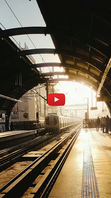 Shutterstock : A view of yellow line Delhi metro entering the station