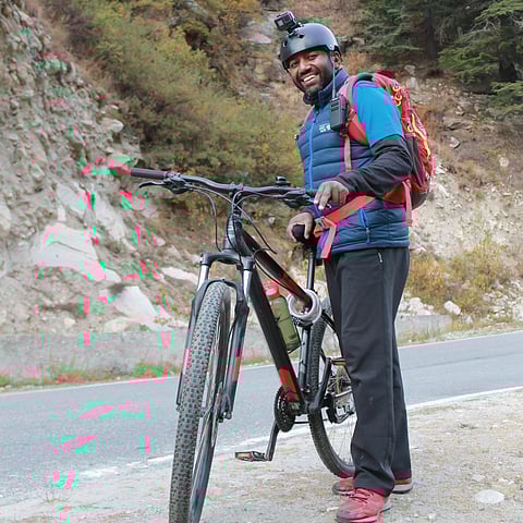 Rency Thomas with his mountain bike
