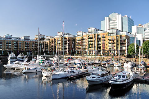 The St Katherine Docks on the east side of Tower Bridge is a tranquil oasis that offers a variety of dining and leisure activities