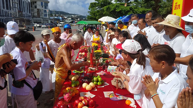 Participants receive blessings during the 2023 Phuket Vegetarian Festival