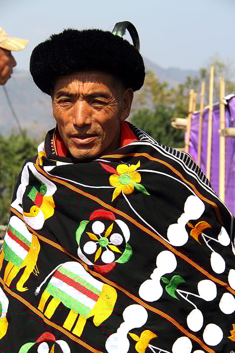 A man wearing Tangkhul Naga with motifs
