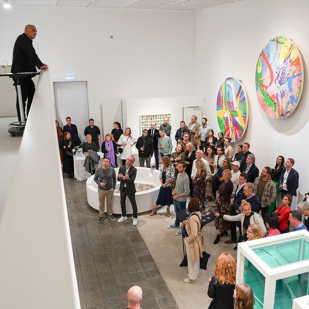 At an exhibition in MUCA