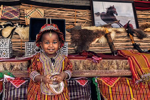An Omani girl wearing ancient Omani dress 