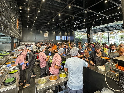 Customers being served at The Rameshwaram Café