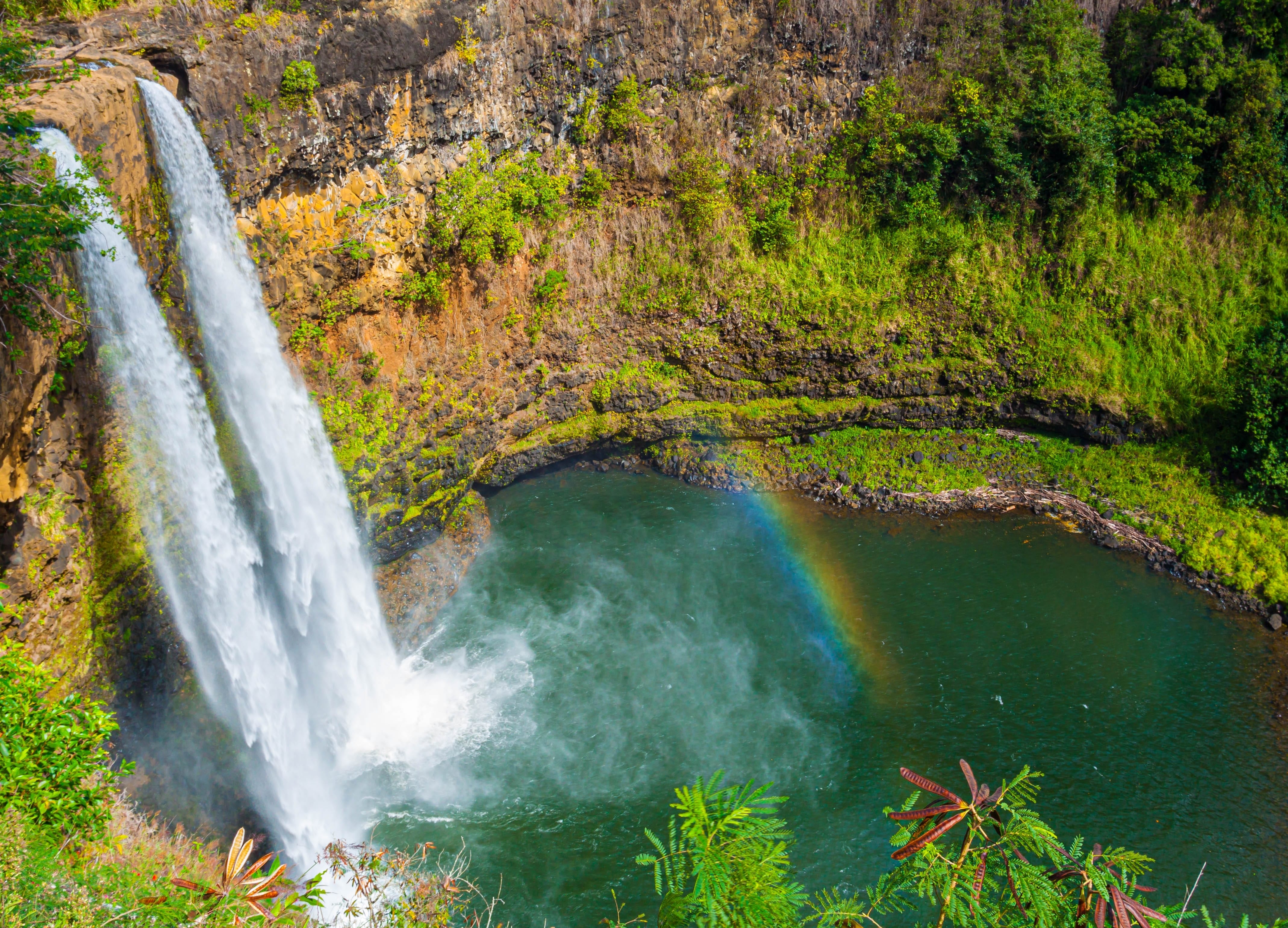 The Wailua Falls cascades into two streams and is easily accessible