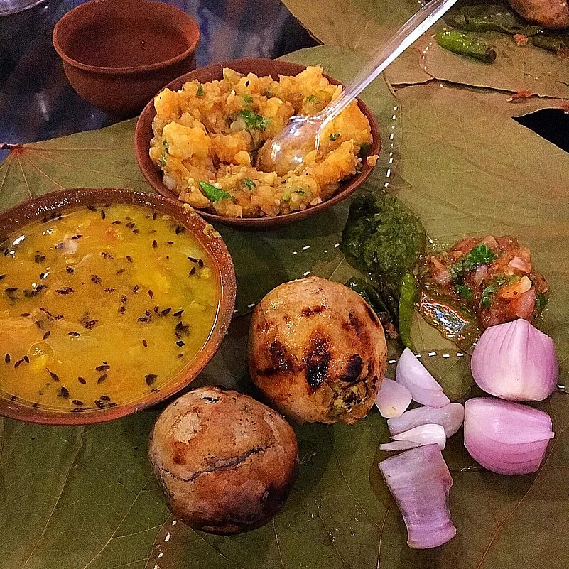 The round baatis or littis in a baati chokha are made with wheat flour and stuffed with a flavourful sattu masala