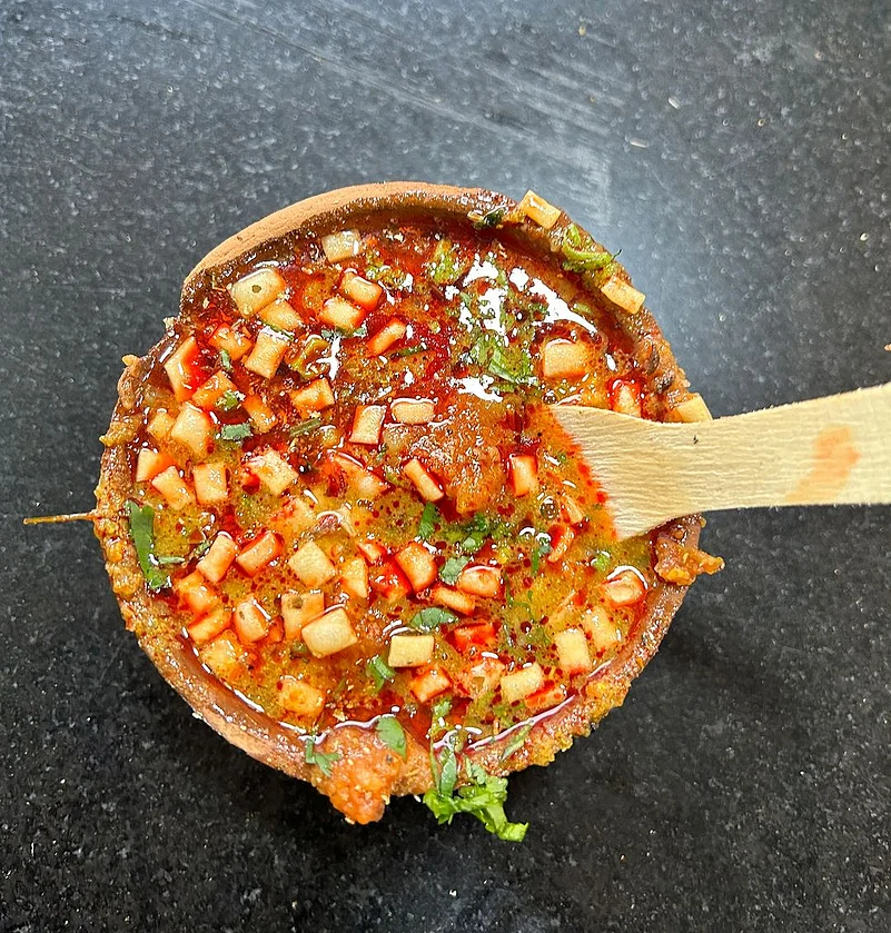 Tamatar chaat is a spicy preparation consisting of tomatoes mixed with asafoetida, pounded ginger, green chillies and spices with the addition of boiled potatoes