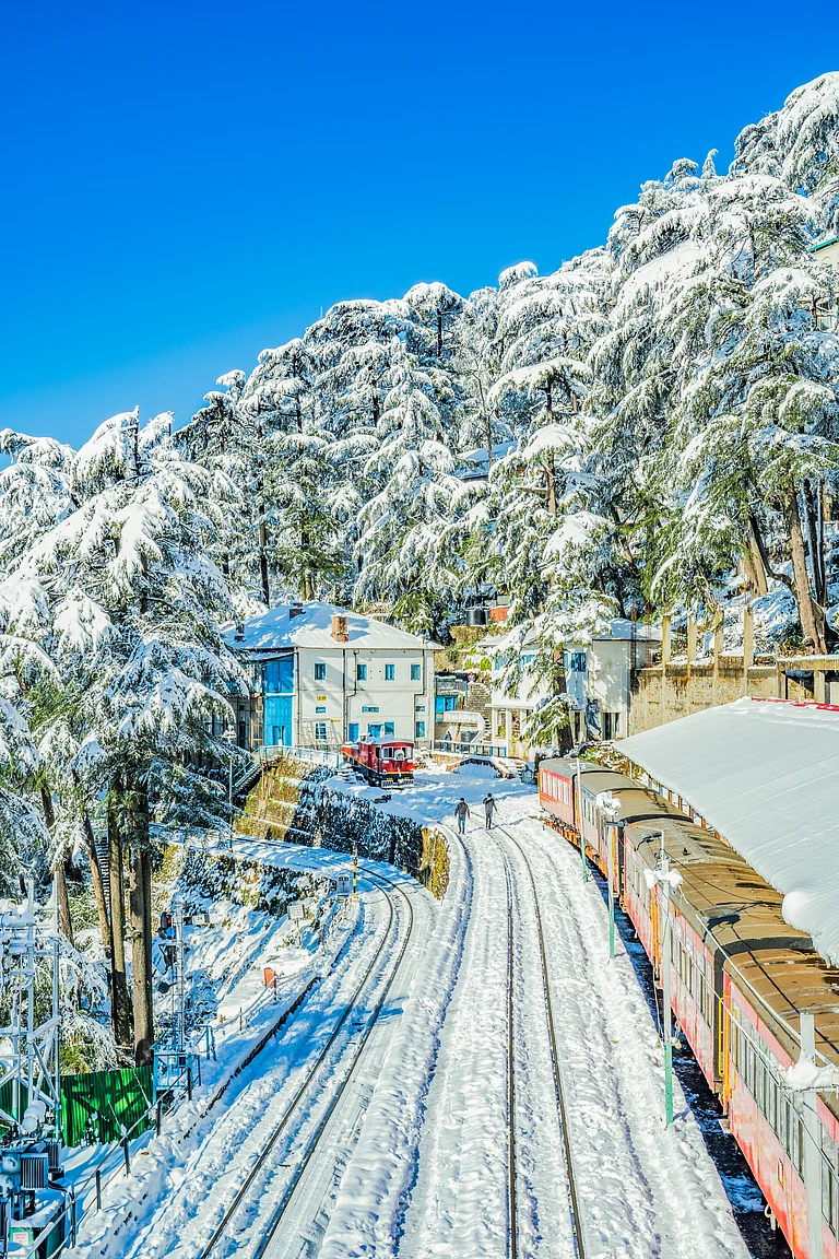 A beautiful view of the snow-capped season in Shimla - Shutterstock