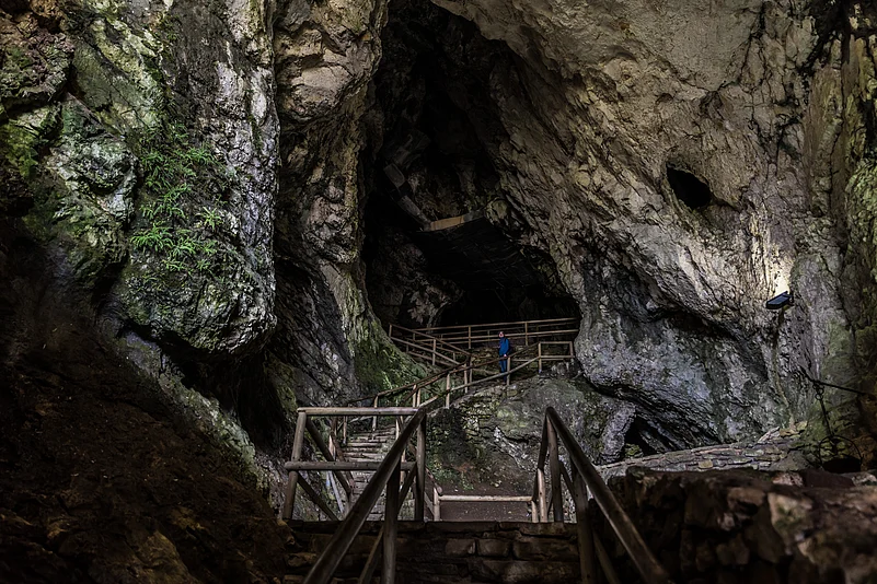 Heading inside Predjama Castles cave