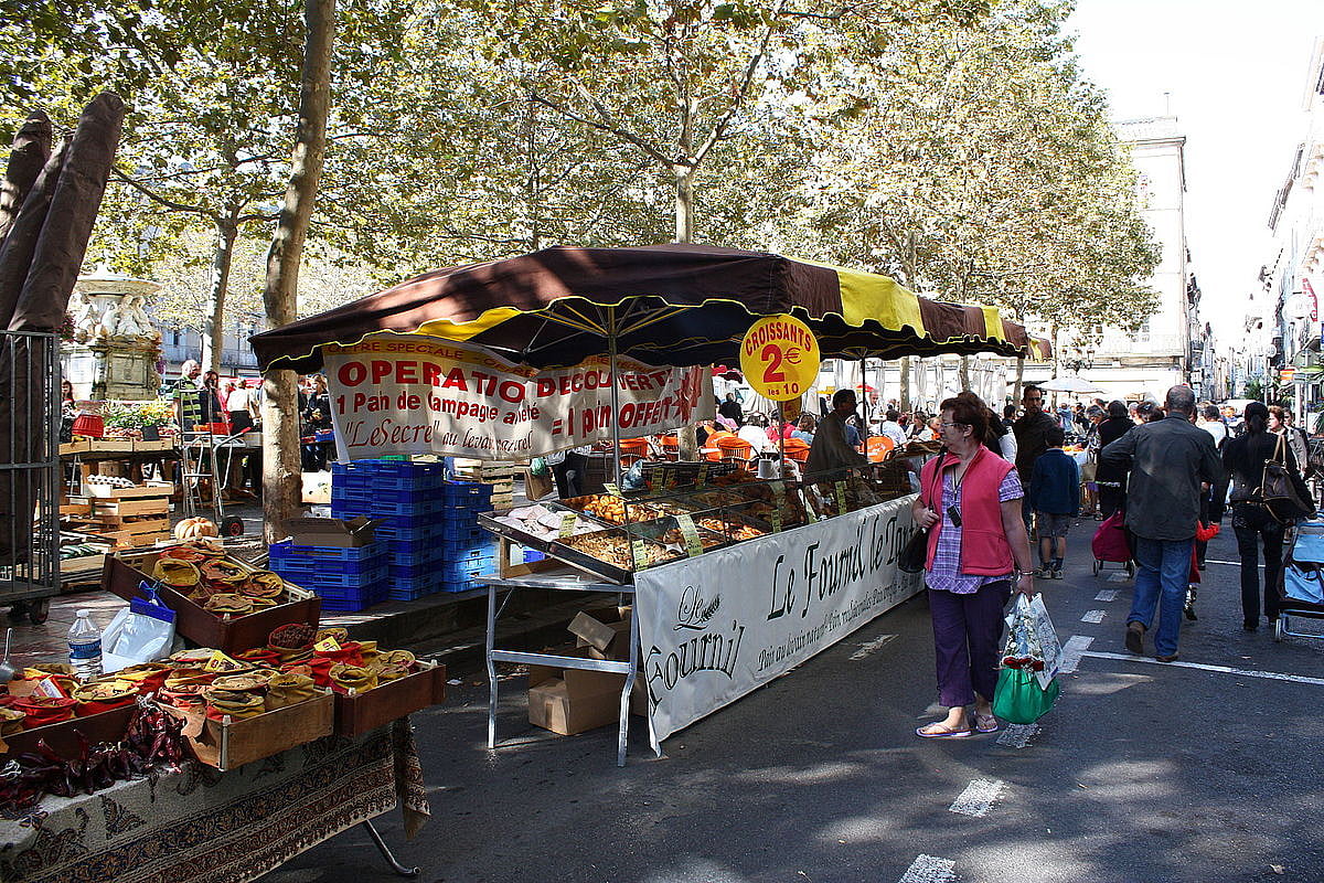 Pick up fresh produce, cheese, and condiments from the markets