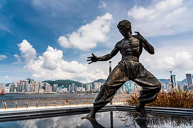 Jack Hong/Shutterstock : A Bruce Lee statue at Hong Kongs Avenue of Stars