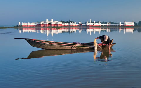 A view of the Rudrasagar Lake with Neermahal Palace in the background