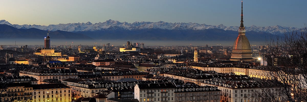 Turins cityscape against the backdrop of the Alps