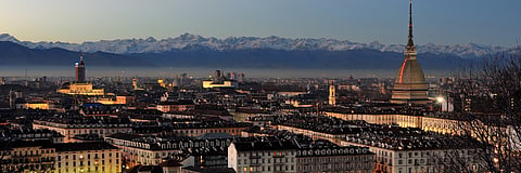 Turin's cityscape against the backdrop of the Alps