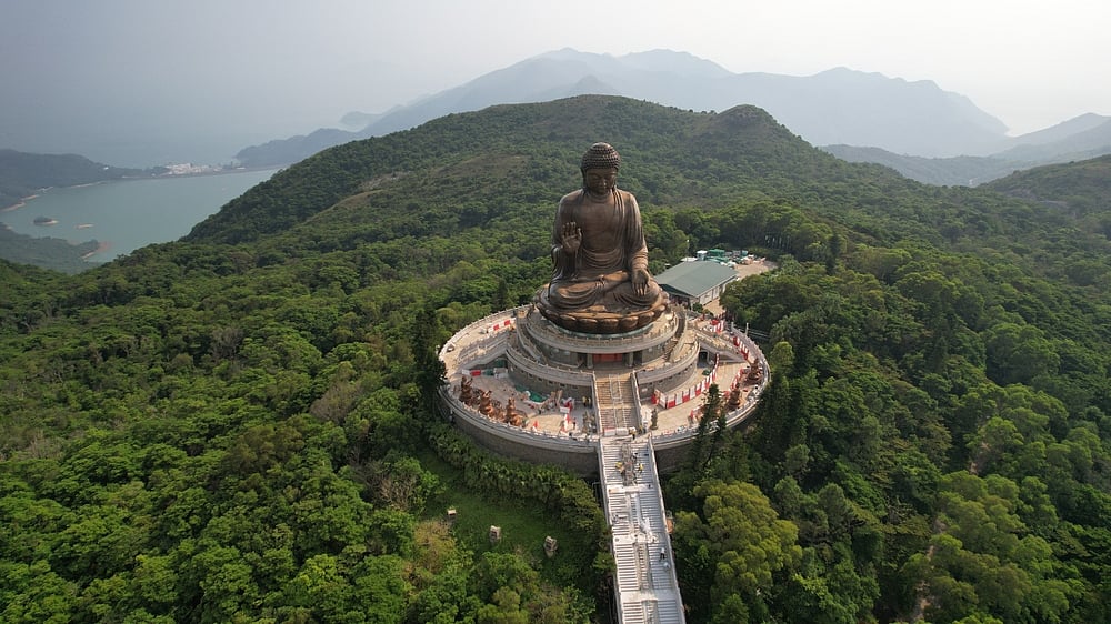 Tian Tan Buddha, known as the Big Buddha, rests high up on a hilltop in the Ngong Ping plateau
