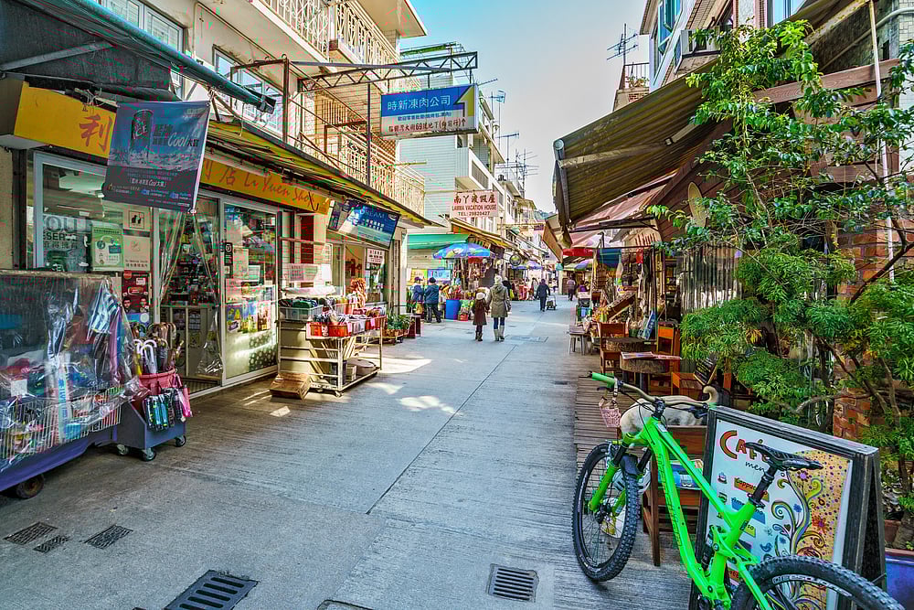 The lively main street of Yung Shue Wan village on Lamma Island 