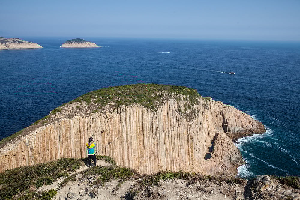 The sheer cliffs and giant hexagonal rock columns off the southeast coast of Sai Kung East Country Park in Hong Kong