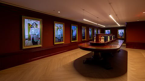 Visitors can interact with framed digital “portraits” of White House staff at "The People’s House: A White House Experience"