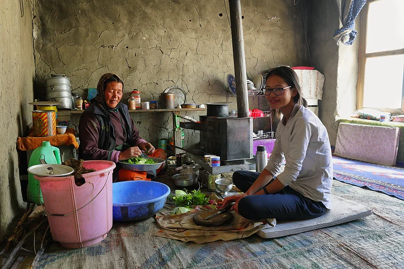 Women cooking a meal at a homestay in Hankar village, Ladakh