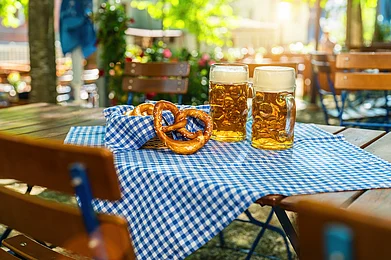 Shutterstock : Enjoy Munichs famous beers and pretzels at these places