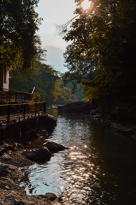 Beutiful sunset and the glimpse of sunrays in the valley of Dehradun at Tapkeshwar Temple