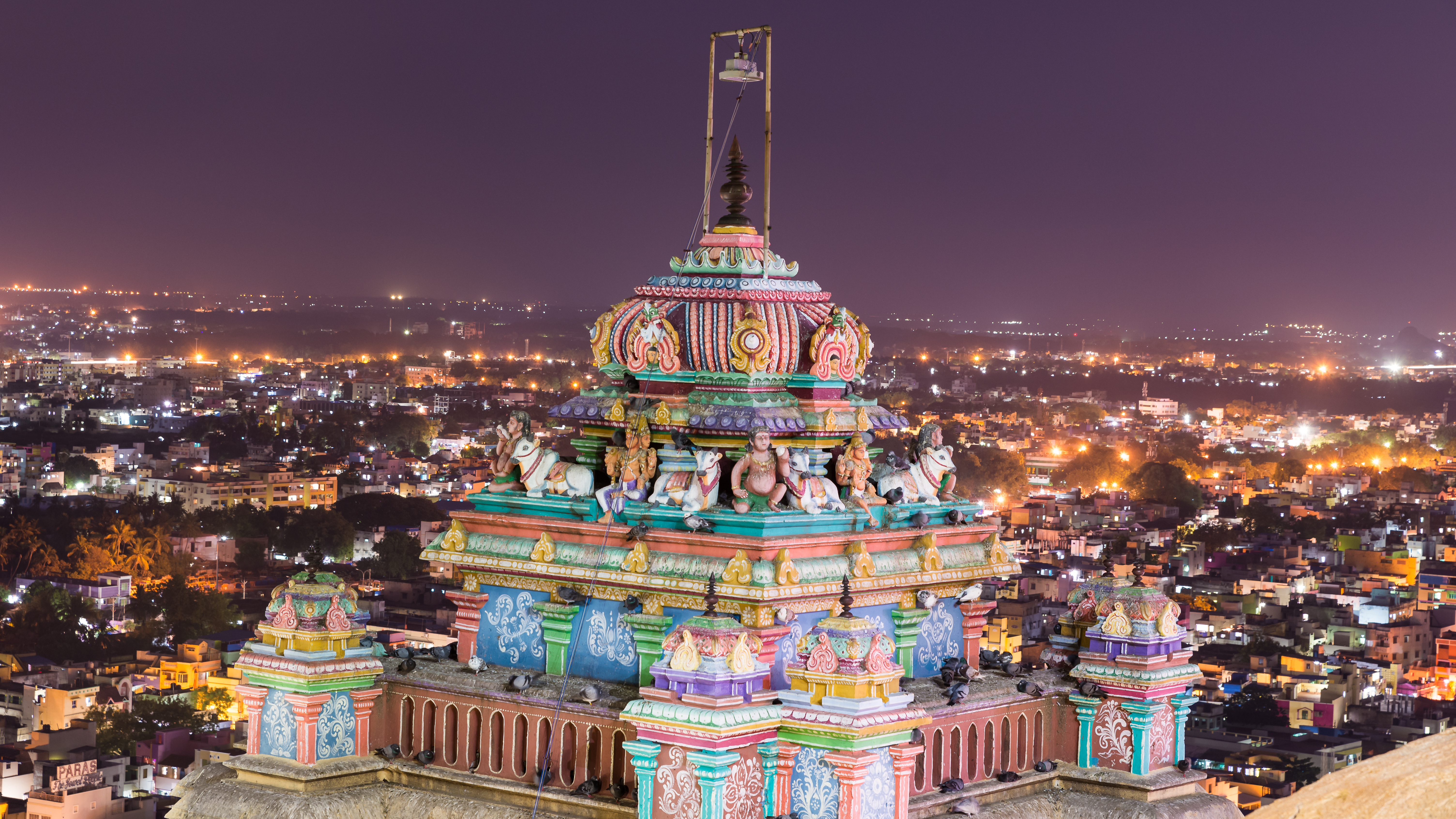 Night view of the dome of the Ucchi Pillayar Temple