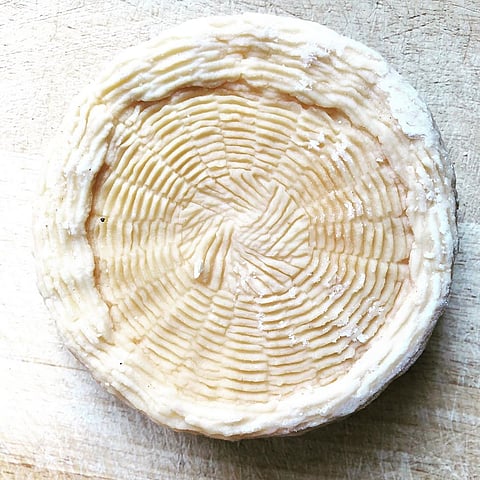 Manoura Sifnou is a semi-hard cheese that is traditionally made from goat or sheep's milk