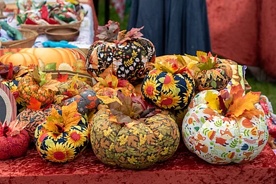 Dave Colman/Shutterstock : Colourfully-decorated soft toy pumpkins for sale in the United Kingdom