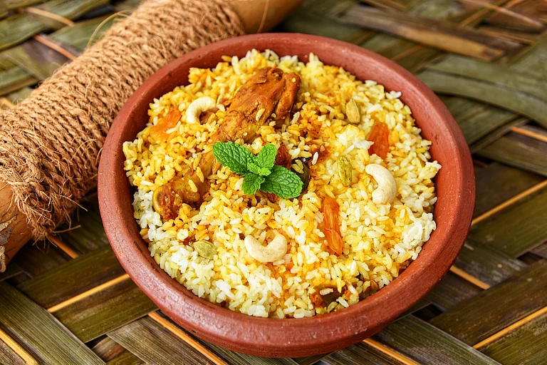 Thalassery Biryani uses Khyma or Jeerakasala, an indigenous variety of rice - Shutterstock.com