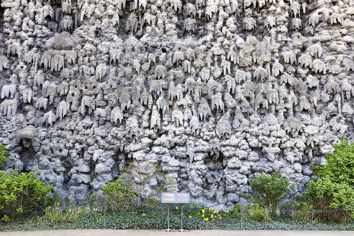 From a distance, the Dripstone Wall seems to be dripping skulls
