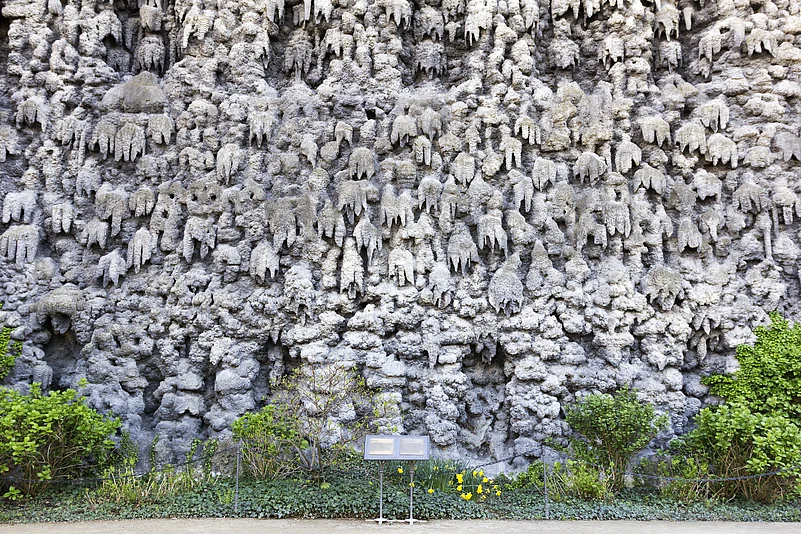 From a distance, the Dripstone Wall seems to be dripping skulls