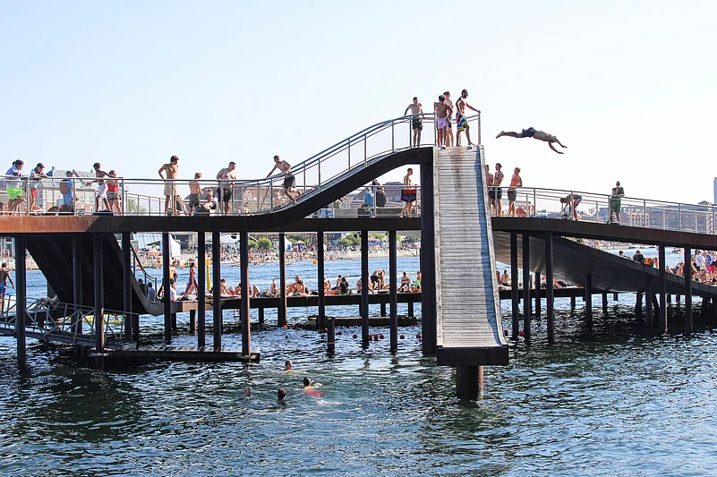 Citizens go for a dip in one of the ten designated swimming areas in the harbour area