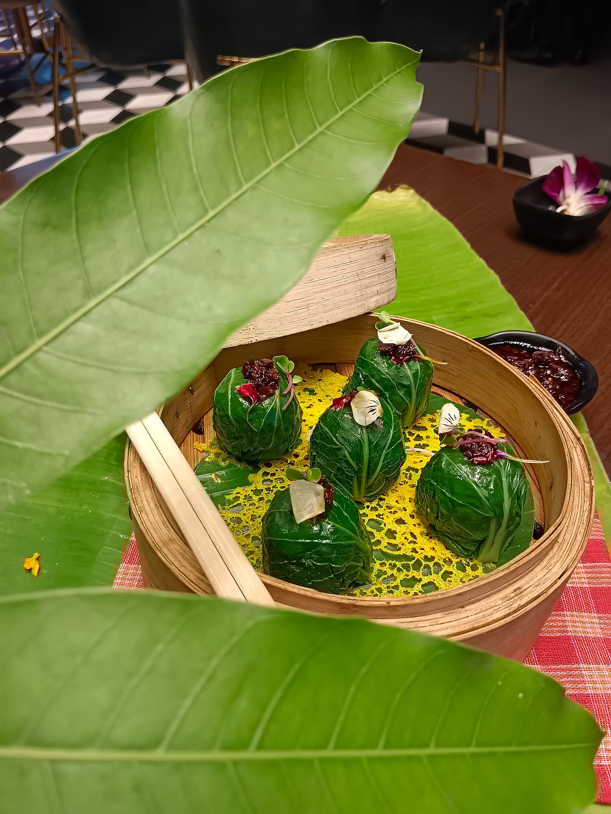 Pokchoy wrapped steamed sorshe bhetki