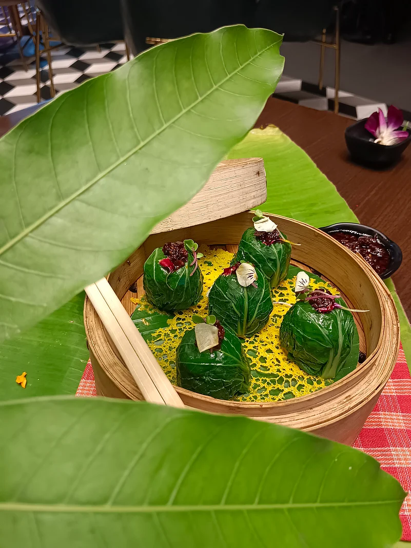 Pokchoy wrapped steamed sorshe bhetki