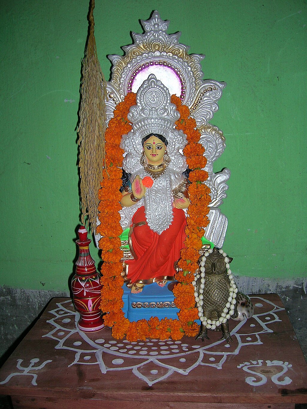 Alpana is an integral part of Kojagari Lakshmi Puja, held soon after Durga Puja