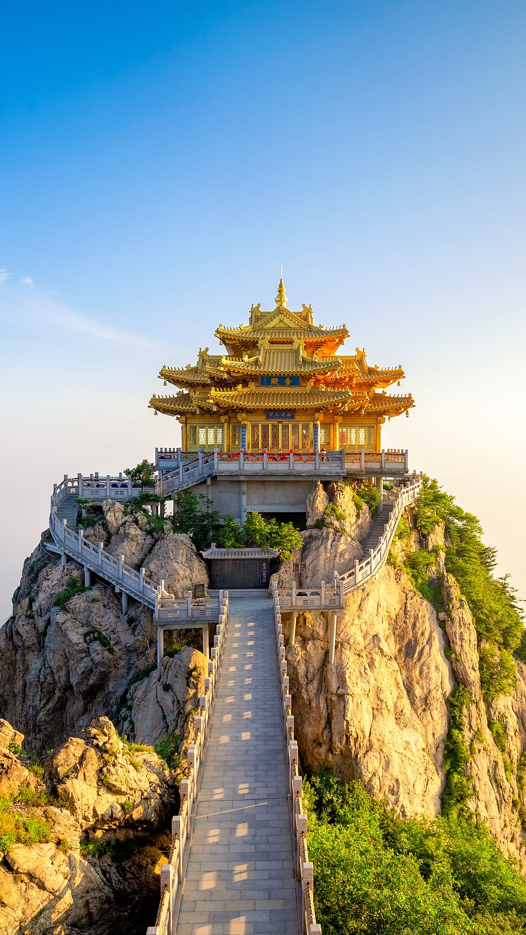A view of the surreal Golden Temple of Laojun Mountain, China