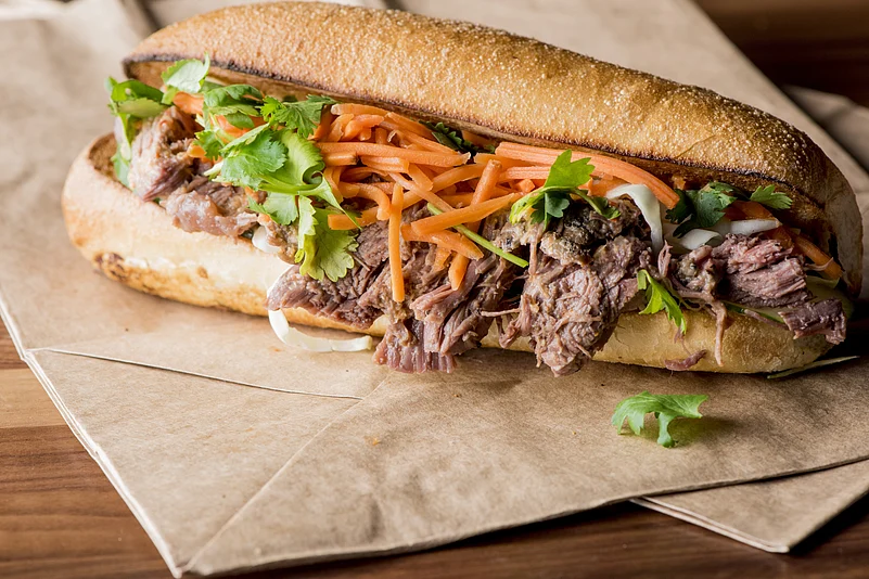 Bánh mì is a popular grab-and-go meal, often enjoyed by busy young adults and office workers
