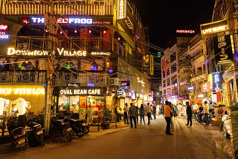 A view of a vibrant night at Hauz Khas Village