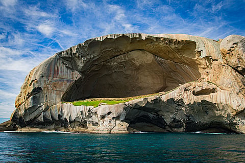 Cleft Island, also known as Skull Rock, is a rugged granite island off the southwest coast of Wilsons Promontory