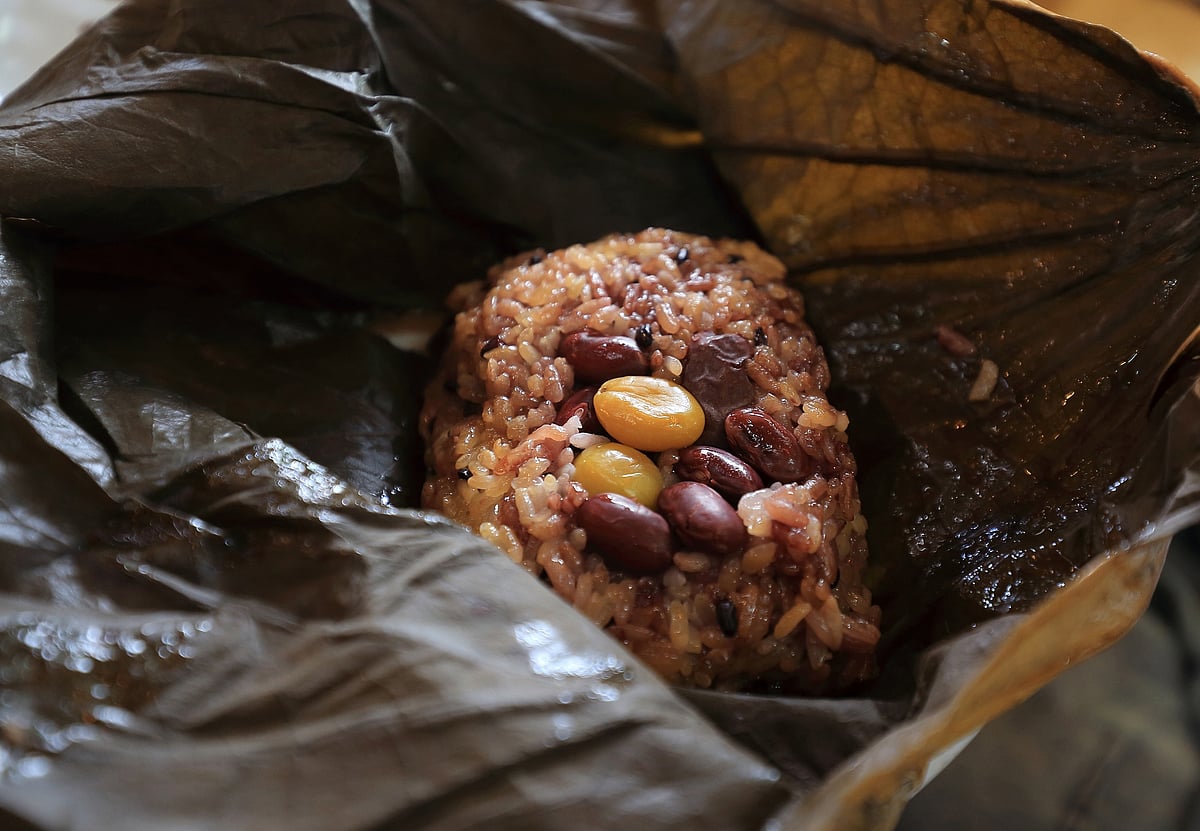 Yeonipbap is a delightful blend of sticky rice, ginkgo nuts, chestnuts, jujubes, and pine nuts