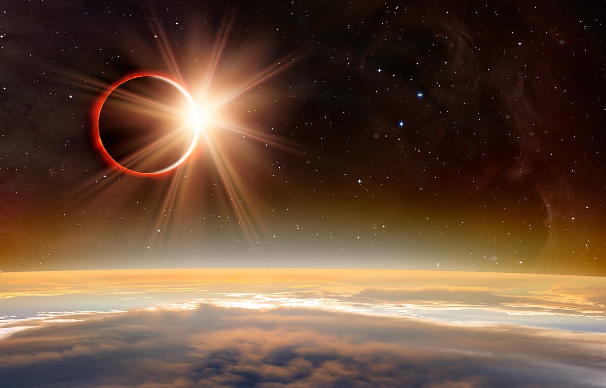 Shutterstock : Solar Eclipse over the planet Earth 