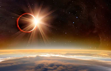 Shutterstock : Solar Eclipse over the planet Earth