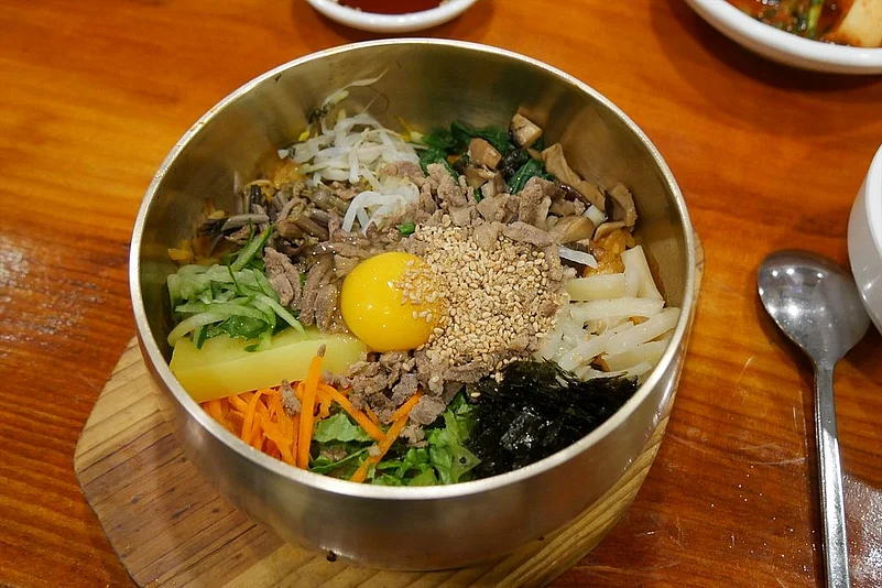 What sets Seongmidang apart from other establishments in the city is the fact that their gochujang is mixed into the rice from the beginning, making it very flavourful